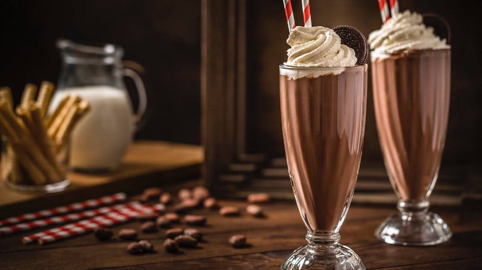 Two chocolate milkshakes